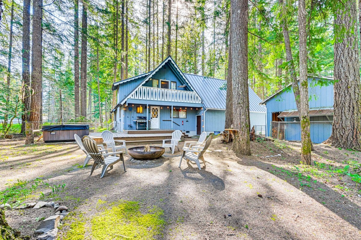 The Packwood house, hot tub and fire pit in the front yard